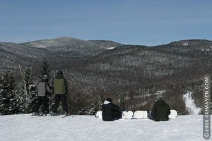 College-aged skiers and riders take to the mountains of northern Vermont